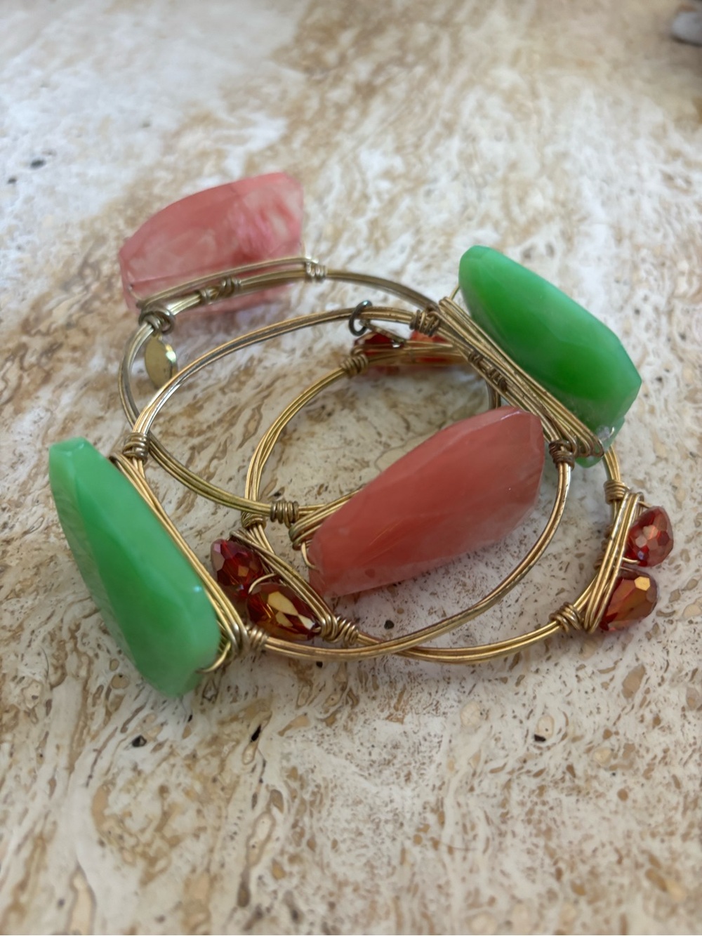 Fancy Stack brand Gold coral stones and orange metallic wired bracelets